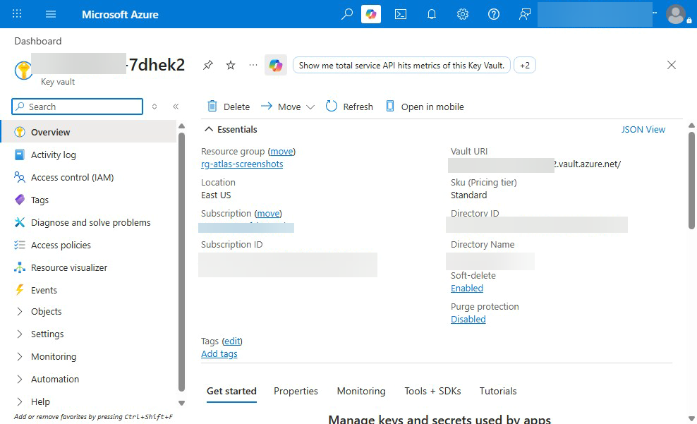 Azure Key Vault Overview blade — Essentials panel showing East US region, Standard pricing tier, Soft-delete enabled, Vault URI, and the Access policies / Objects / Settings left-nav. Key Vault is the canonical secrets/keys/certificates store for every CSA-in-a-Box deployment.